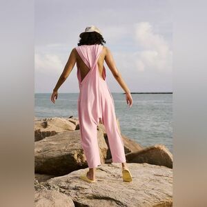 NWT Free People FP Movement Hot Shot Twisted Onesie Jumpsuit in Pinky Fuchsia
